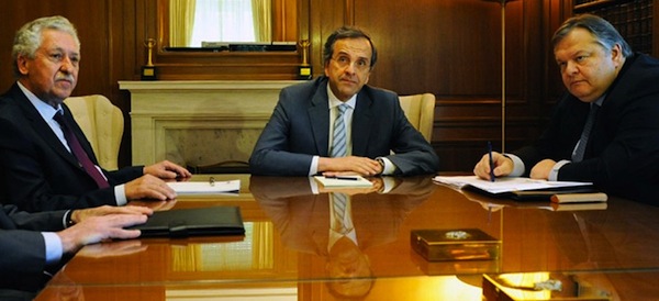 Greek Prime Minister Antonis Samaras (C) with DIMAR chief Fotis Kouvelis (L) and PASOK head Evangelos Venizelos