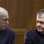 Former PASOK leader George Papandreou (L) with its new leader Evangelos Venizelos