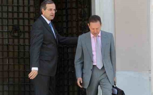 Prime Minister Antonis Samaras (L) with Finance Minister Yannis Stournaras