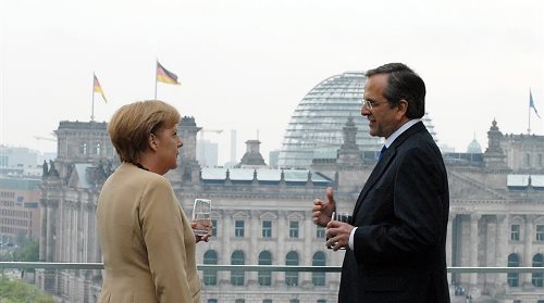 Greek Premier Antonis Samaras and German Chancellor Angela Merkel