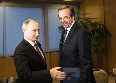 Russian President Vladimir Putin (L) with Greek Premier Antonis Samaras
