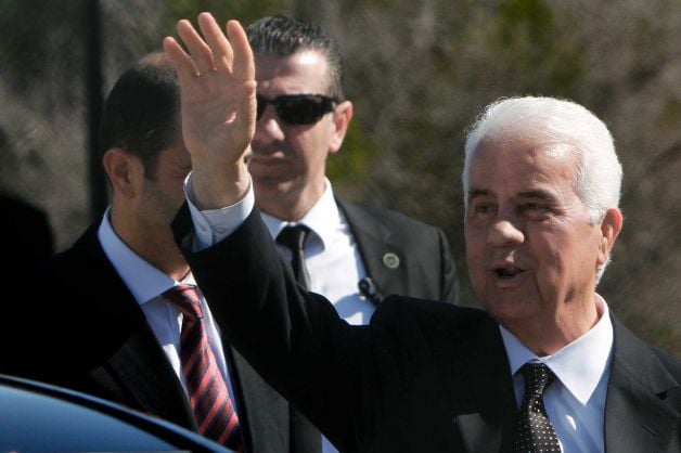 New Cypriot President Dervis Eroglu waves to the crowd