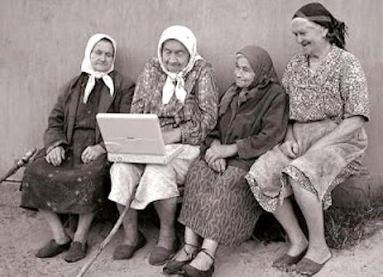 Traditional women with a computer