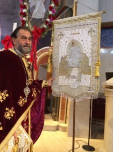 Rev. Paul Palesty with Banner of Ascension in memory of Rev. Anastasios Diakovasilis. Photo by Despina Siolas, MD/PH.D.