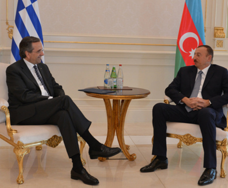 Greek Premier Antonis Samaras (L) with Azeri President Ilham Aliyev