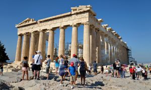 Tourists in Acropolis of Athens, Greece