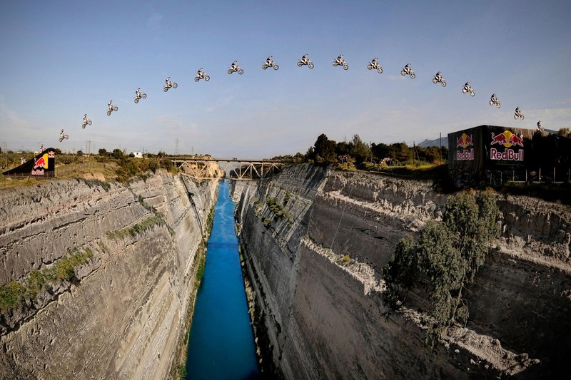 28 years old Australian stunt Motocrosser Robbie Maddison jumped over the 85-metre wide Corinth Canal at height of nearly 100 metres in Greece on Tursday, 08-04-2010. Free image for editorial usage only: Photo by Predrag Vuckovic for Red bull Photofiles NO SALES. FOR EDITORIAL USE ONLY. NOT FOR SALE FOR MARKETING OR ADVERTISING CAMPAIGNS.
