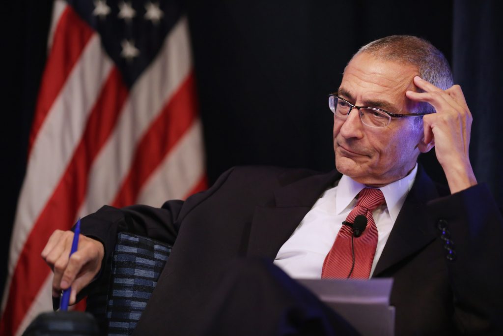 WASHINGTON, DC - OCTOBER 24: Center for American Progress co-founder John Podesta moderates a panel discussion during a conference commemorating the 10th anniversary of the center at the Astor Ballroom of the St. Regis Hotel October 24, 2013 in Washington, DC. Former Clinton Administration Chief of Staff Podesta co-founded the liberal public policy research and advocacy organization as a think tank that rivals conservative policy groups, such as the Heritage Foundation and the American Enterprise Institute. (Photo by Chip Somodevilla/Getty Images)