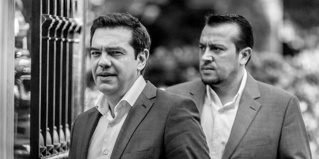 Alexis Tsipras, Greece's Prime Minister, left, and Nikos Pappas, Greece's Minister of State, right, outside the Greek Presidential Palace after meeting with party leaders in Athens, Greece, on July 6, 2015, before the critical EU Summit in Brussels.