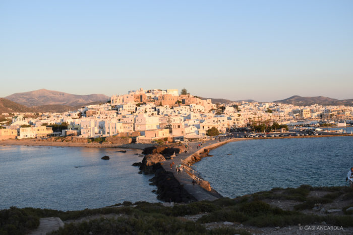 The main town of Naxos, Chora, seen from the islet of Ariadne, the Portara (Courtesy of Gabi Ancarola).