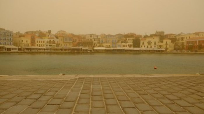 Port of Chania, blurred by the African dust.