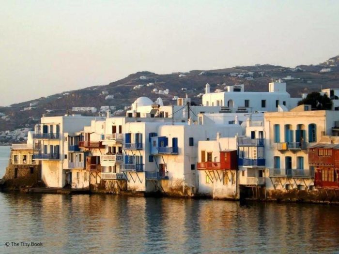 Reflections of the sunset over Little Venice, Mykonos island (Courtesy of The Tiny Book).