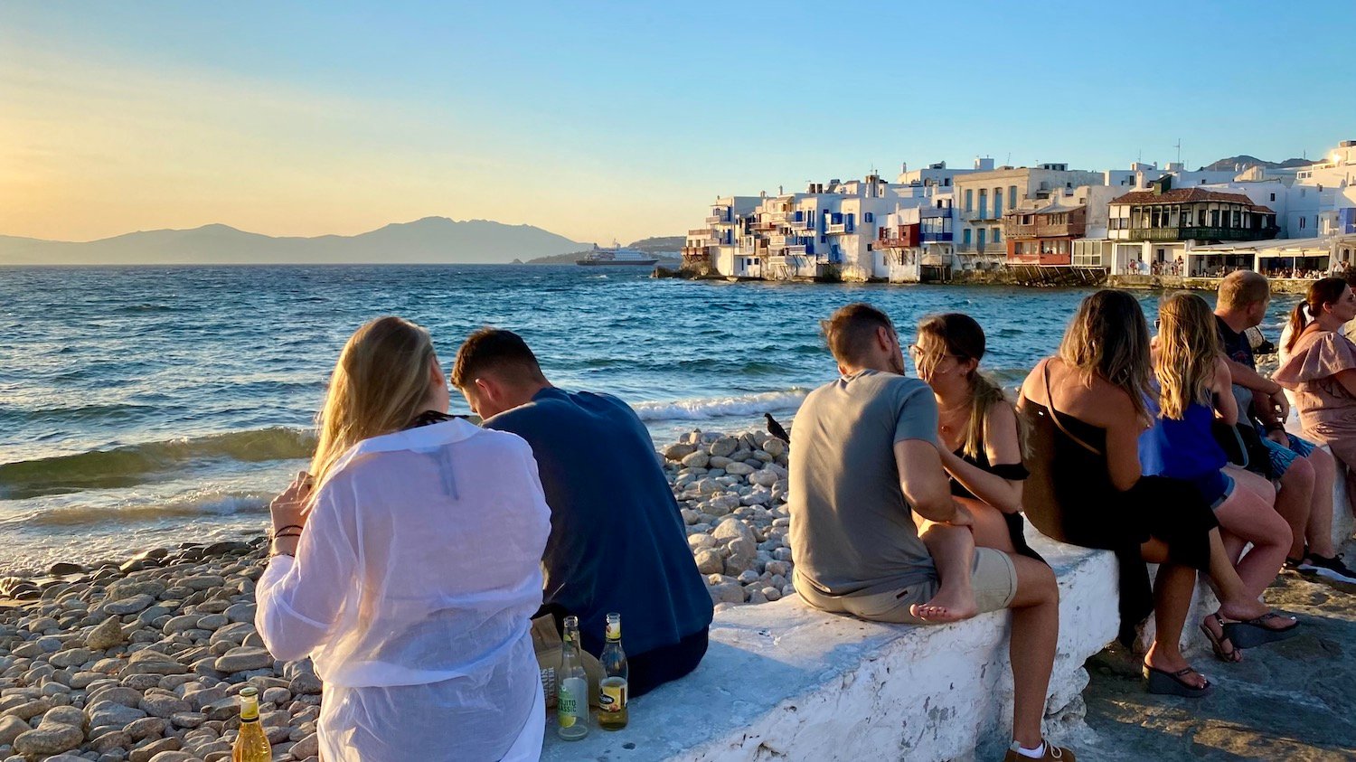 Groups of greeks enjoying Mykonos, Greece.