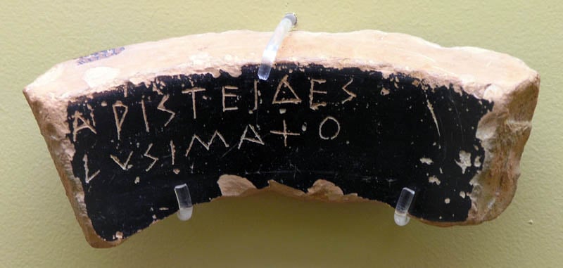 Ostracon bearing the name of Aristides, 483-482 BC. Ancient Agora Museum in Athens. 