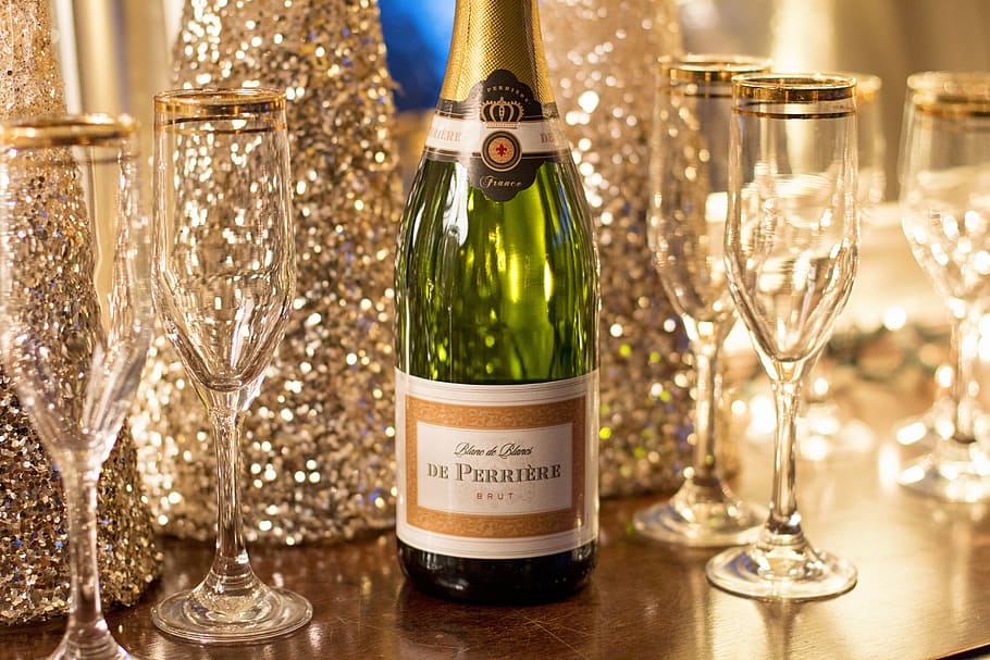 Champagne bottle with glasses during a celebration