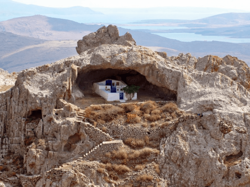 An open-air church on top of a mountain in a half open cave located in Lemnos island Greece. It's named Panagia Kakaviotissa