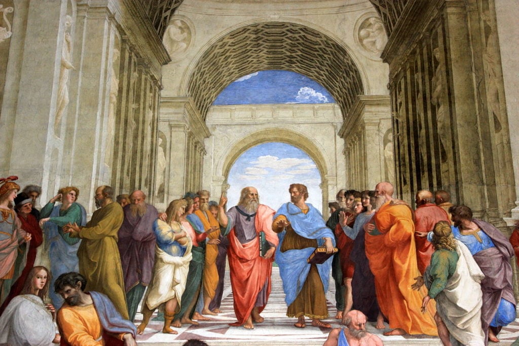 Plato and Aristotle walking in school of Athens
