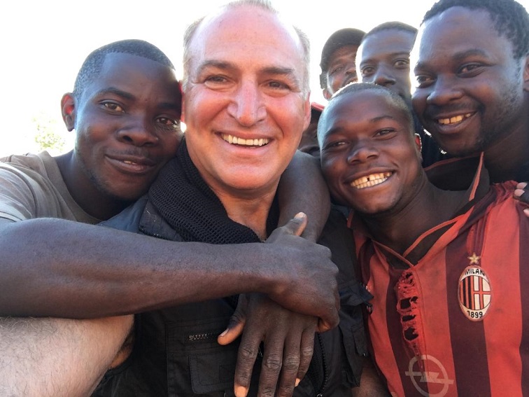 Yianni Melas with artisanal miners in Africa.