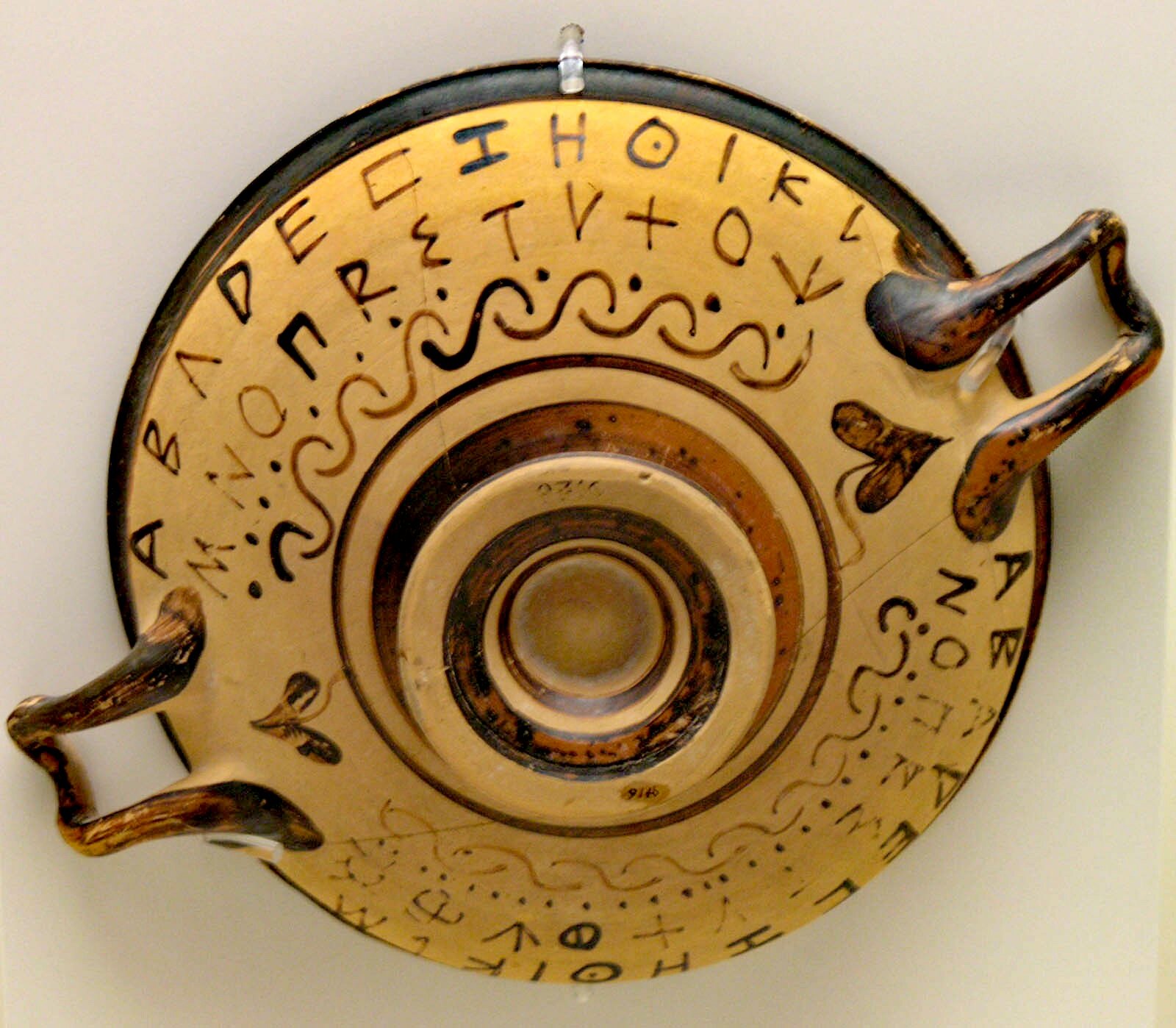 Early Greek alphabet painted on the body of an Attic black-figure cup