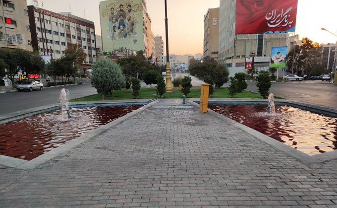 A fountain with red dyed water in Tehran.