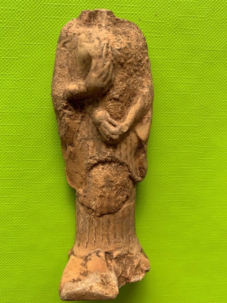 Clay figurine of a female figure