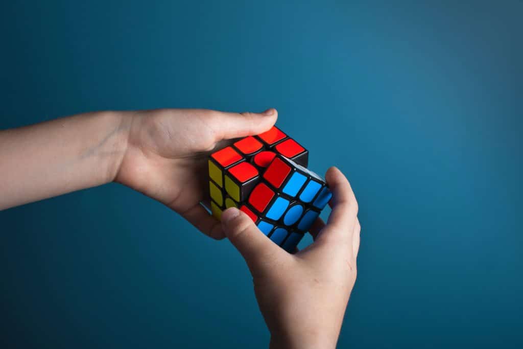 11-year-old plays with rubik's cube