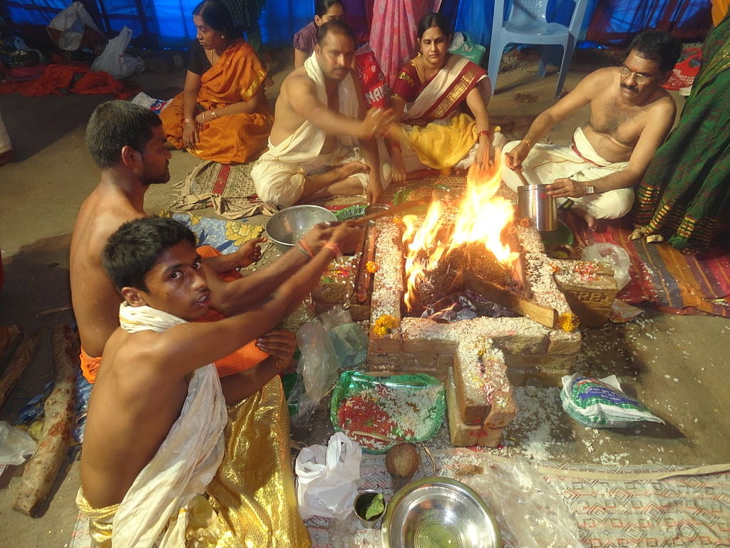 Yajna, holy fire ceremony India, offerings to the gods based on rites prescribed in the earliest scriptures of ancient India, the Vedas
