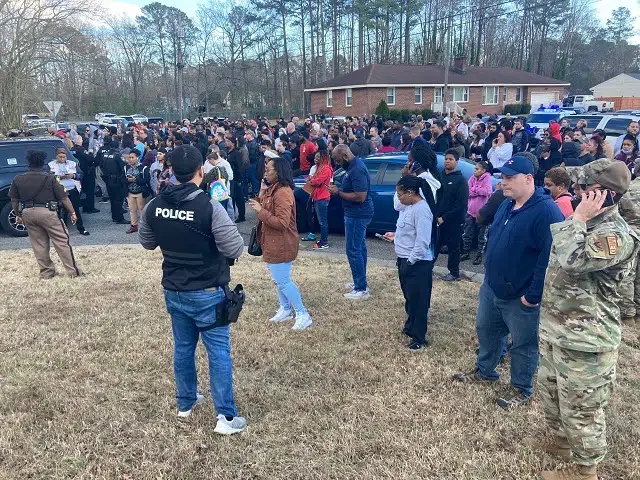 Crowds gathered outside Richneck Elementary School after a classroom shooting incident on January 6, 2023. 