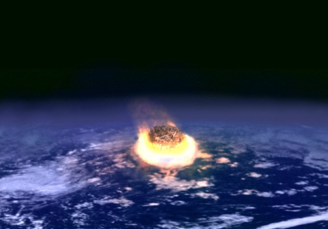 The impact of asteroid hitting the Earth. 