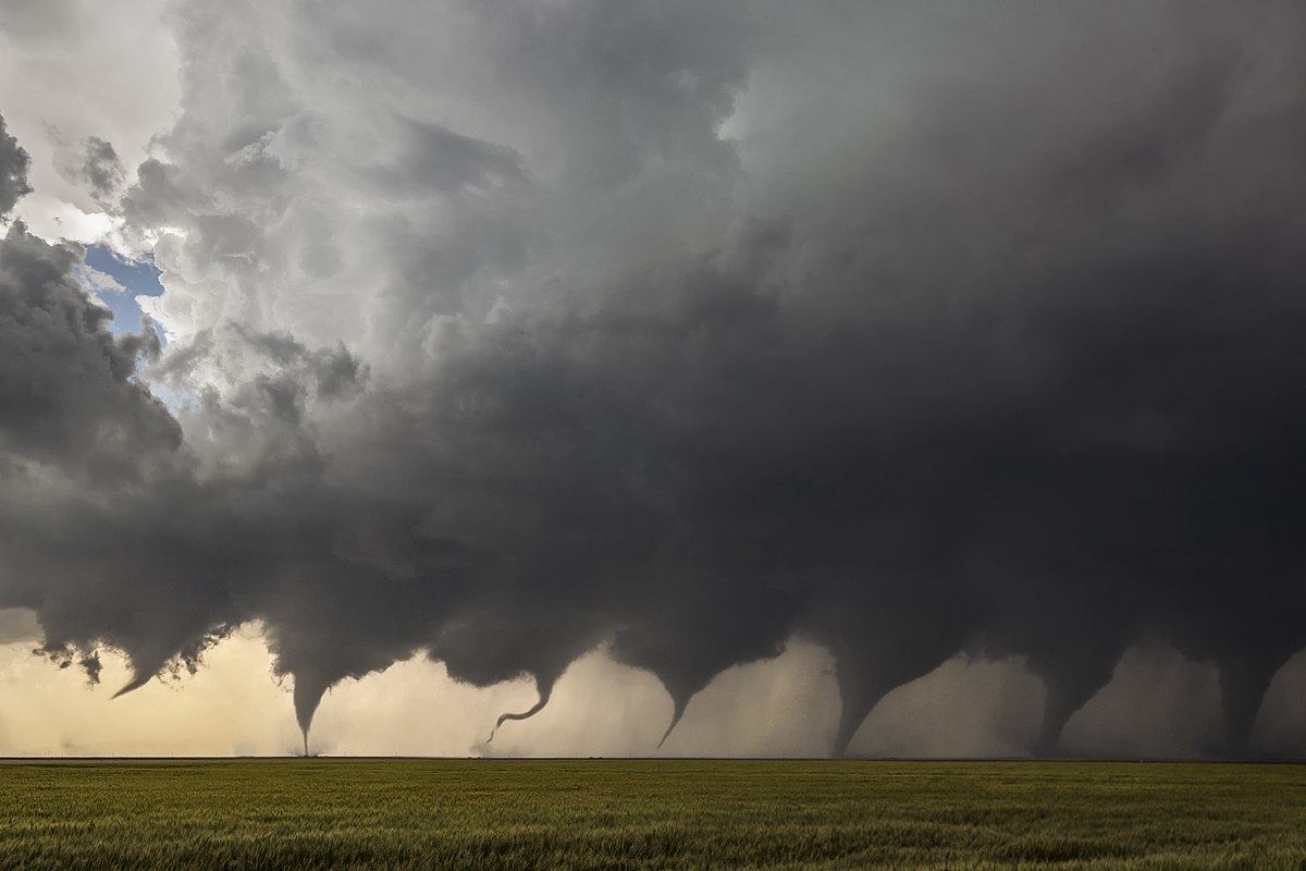 evolution of a tornado : Composite of eight images shot in two sequences as a tornado formed north of Minneola, Kansas