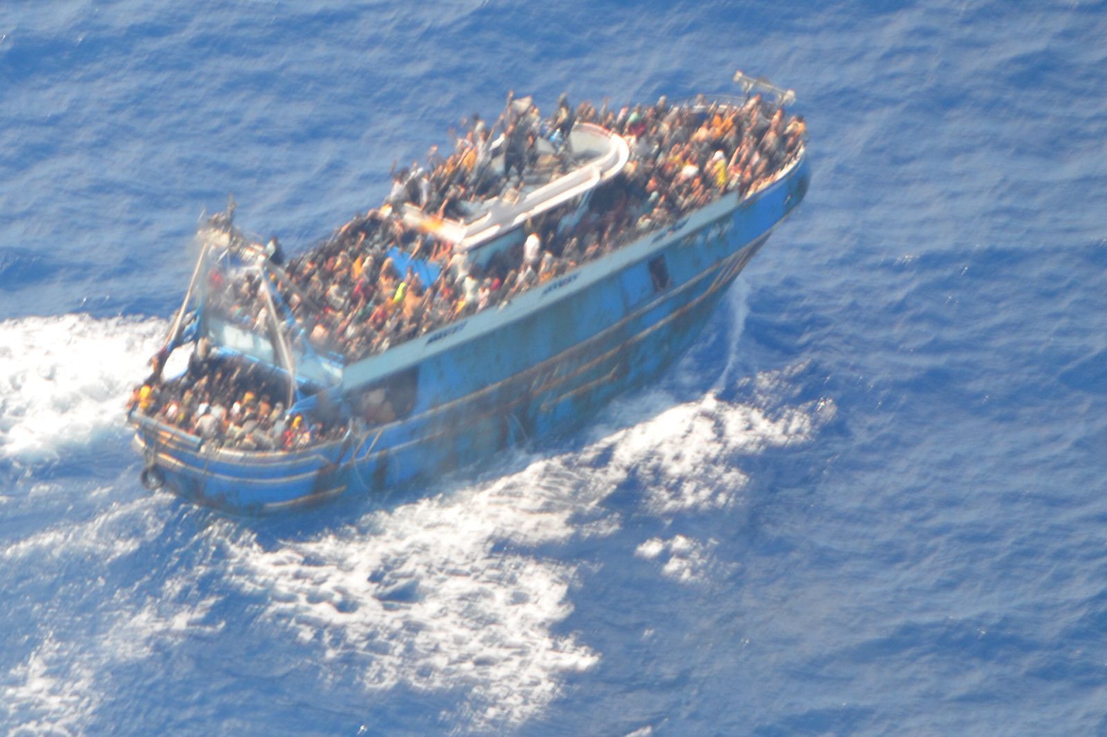 An overcrowded fishing boat carrying migrants.
