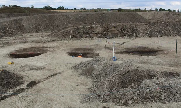 Archaeologists excavating a prehistoric site in England unveil Mesolithic pits dating back thousands of years. 