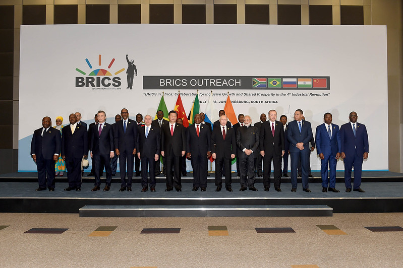 leaders of enlarged BRICS standing together