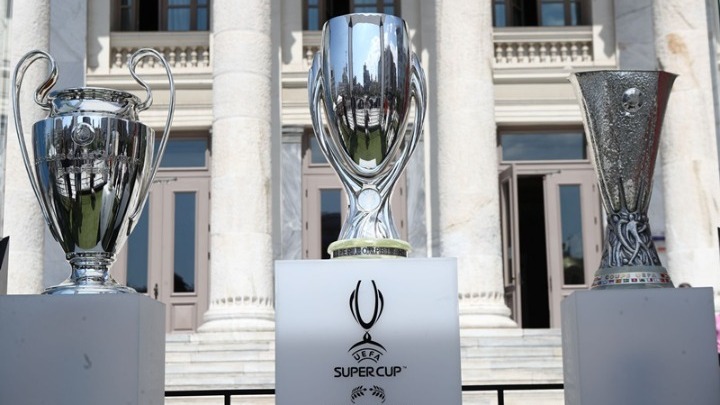 The Champions League, Europa League and Super Cup trophies in Piraeus.