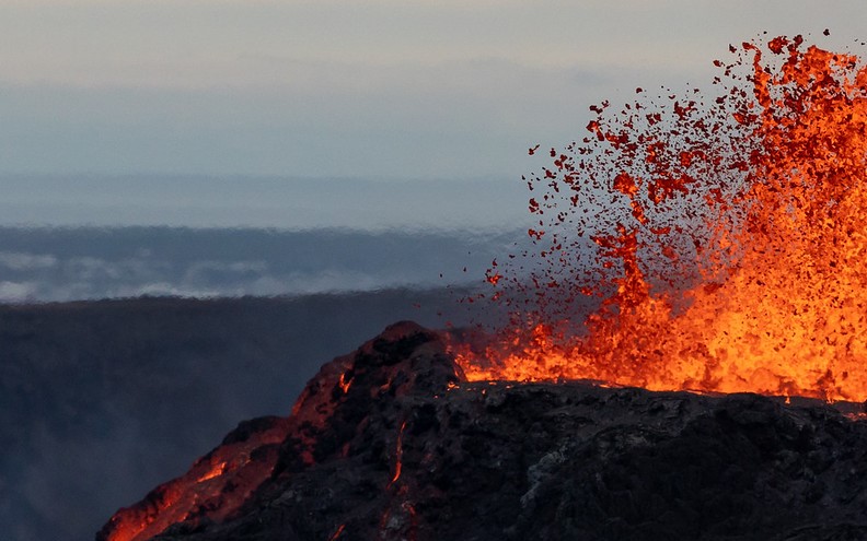 A volcanic eruption releases plumes of ash and lava with carbon dioxide being the primary trigger behind explosive basaltic volcanoes