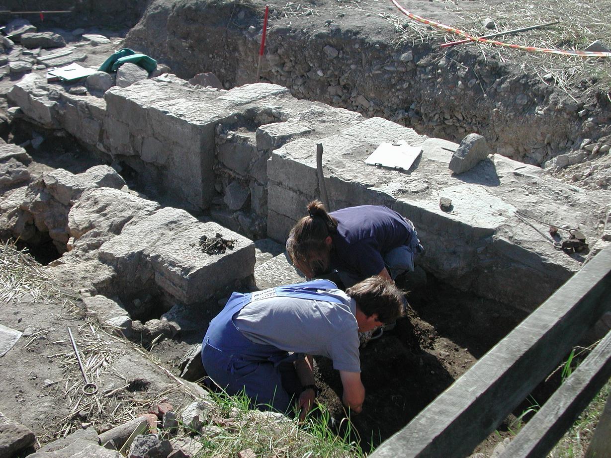 Archaeologists in Italy unearthing a tomb