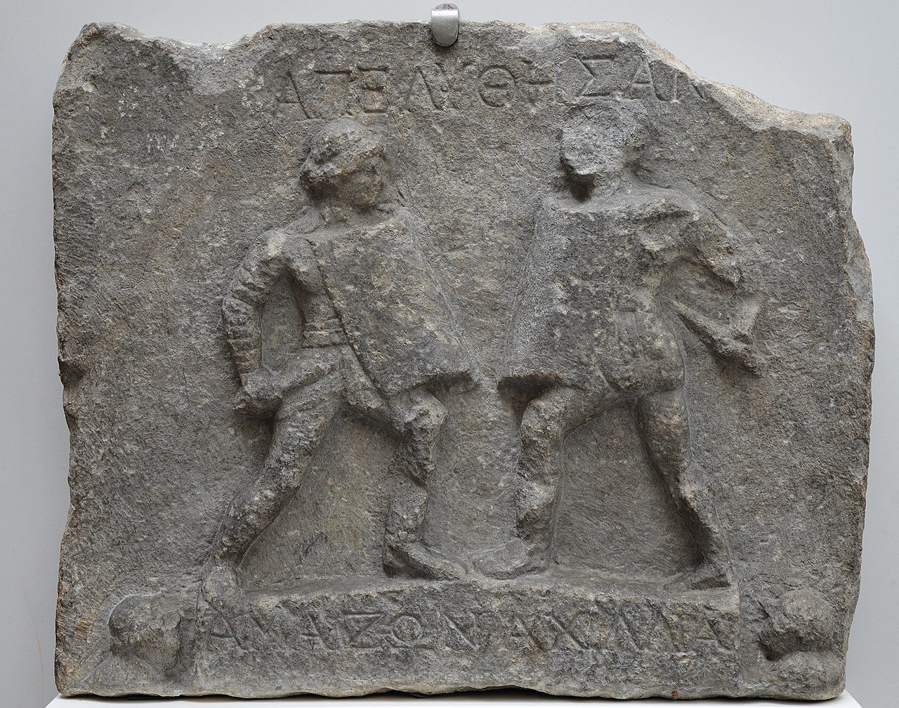 Marble relief with female gladiators