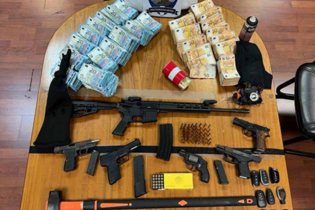 Heavy weapons and cash were discovered in the possession of the Greek trapper that stole ATM'S 