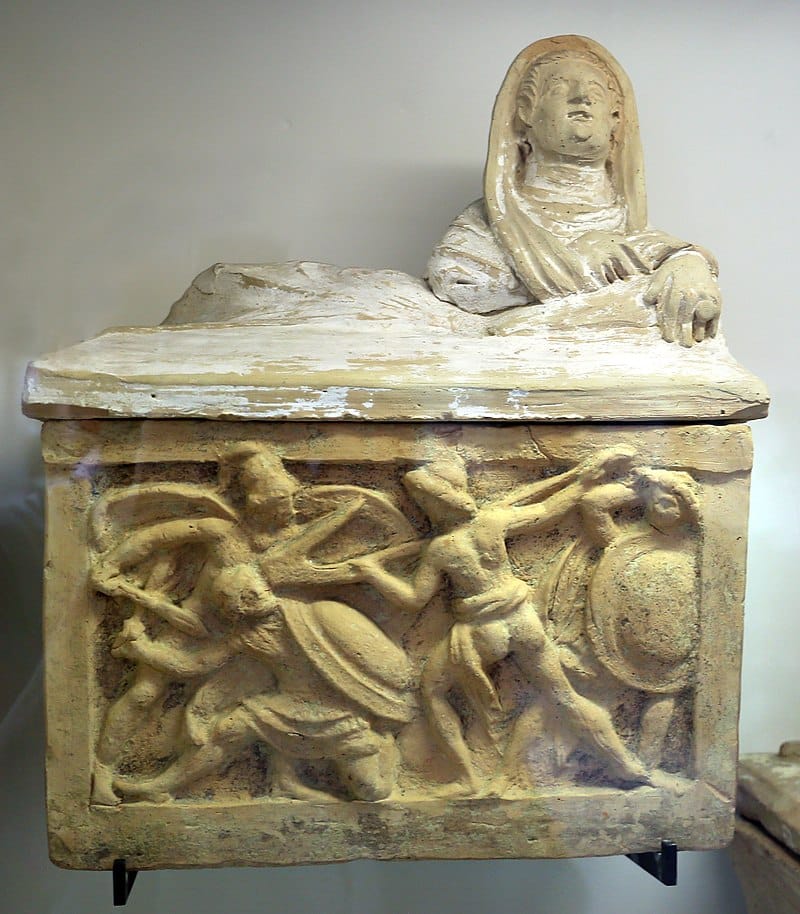 Echetlus fighting with the plow on an Etruscan funerary urn, another one of the Ancient Greek mysterious events.