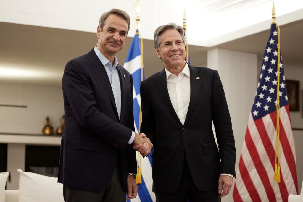 Mitsotakis and Blinken shake hands before their meeting