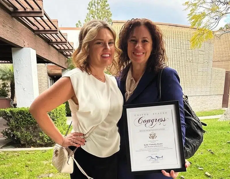 Kelly Vlahakis- Hanks (R) with colleague Amber Enriquez, Congress Award 2024