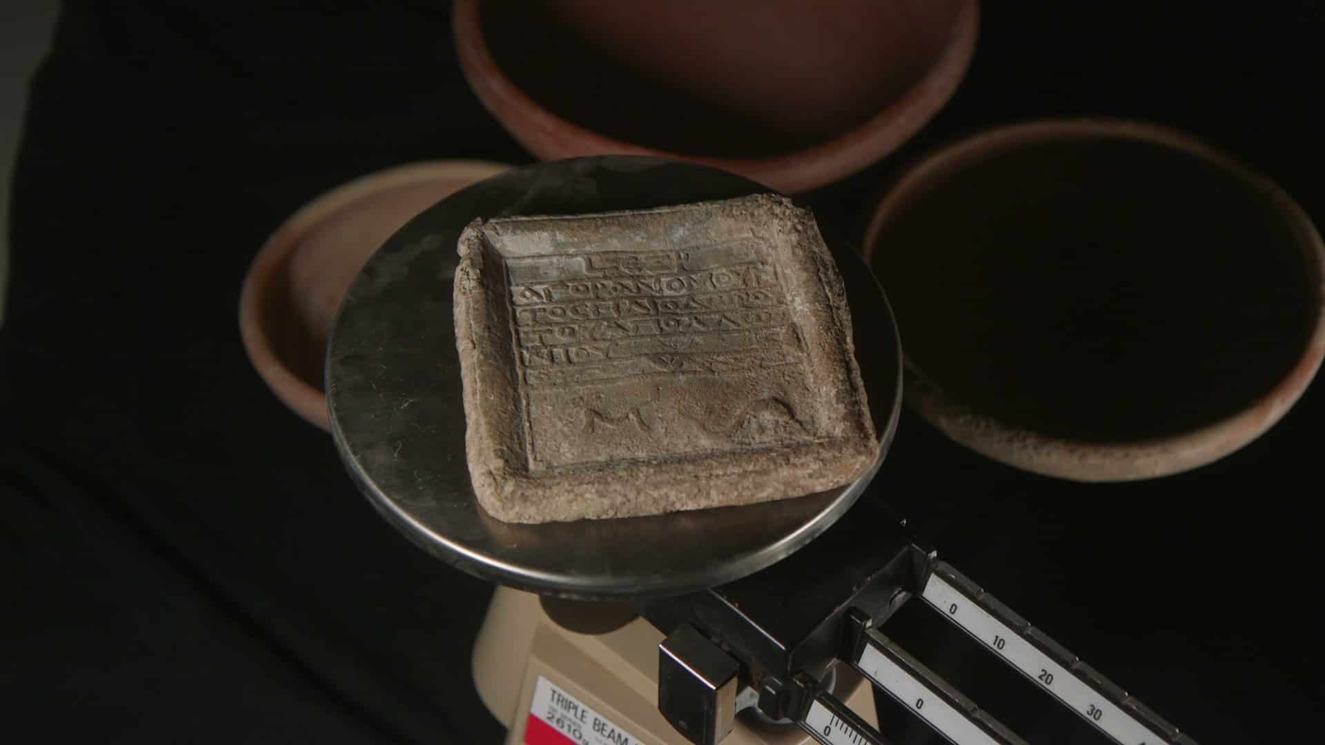 A 2,150-year-old Greek weighing scale weight inscribed with the name Heliodorus, seized in Jerusalem