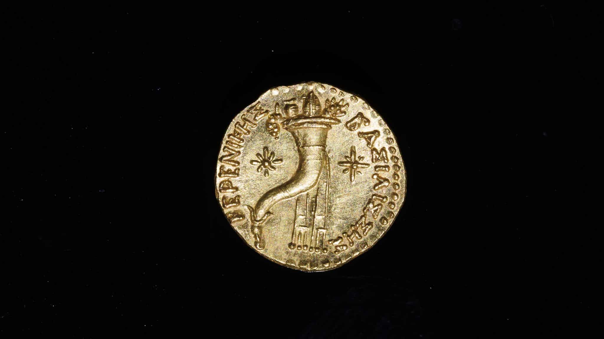 A rare 2,200-year-old gold coin depicting Queen Berenice II of Egypt, discovered in Jerusalem’s City of David