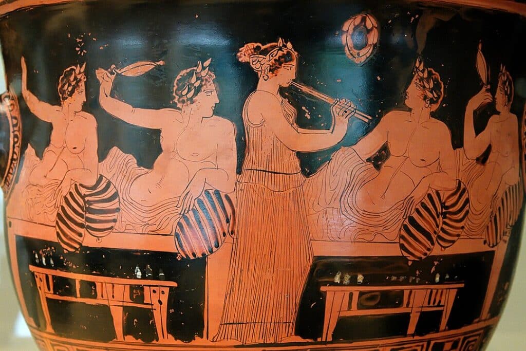 depiction of a symposium on a Greek vessel
