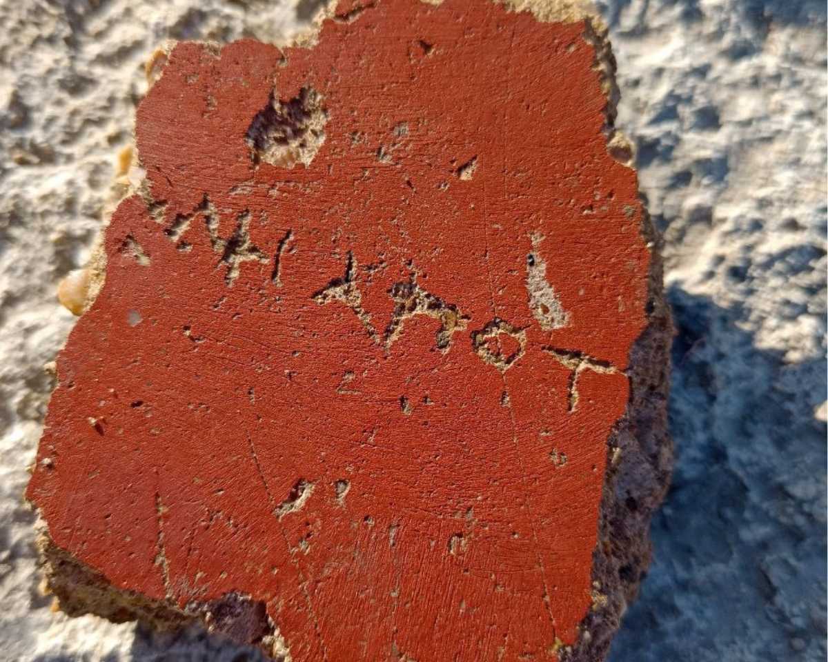 Ancient Greek inscription on the temple plaster