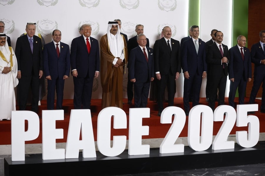 (front row L-R) Turkish President Recep Tayyip Erdogan, Egyptian President Abdel Fattah al-Sisi, US President Donald Trump, Emir of Qatar Cheikh Tamim ben Hamad al-Thani, King Abdullah II of Jordan, and fellow dignitaries pose during the family picture at the Gaza Peace Summit