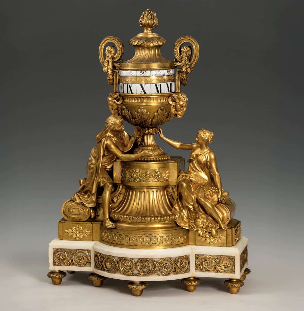 Mechanical table clock made of gold-plated bronze and marble by French watchmaker J.B. Baillon