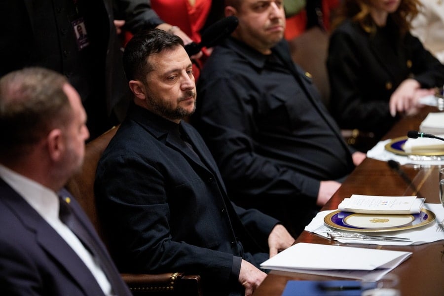 President of Ukraine Volodymyr Zelensky (C) participates in a bilateral meeting with US President Trump in the Cabinet Room of the White House.