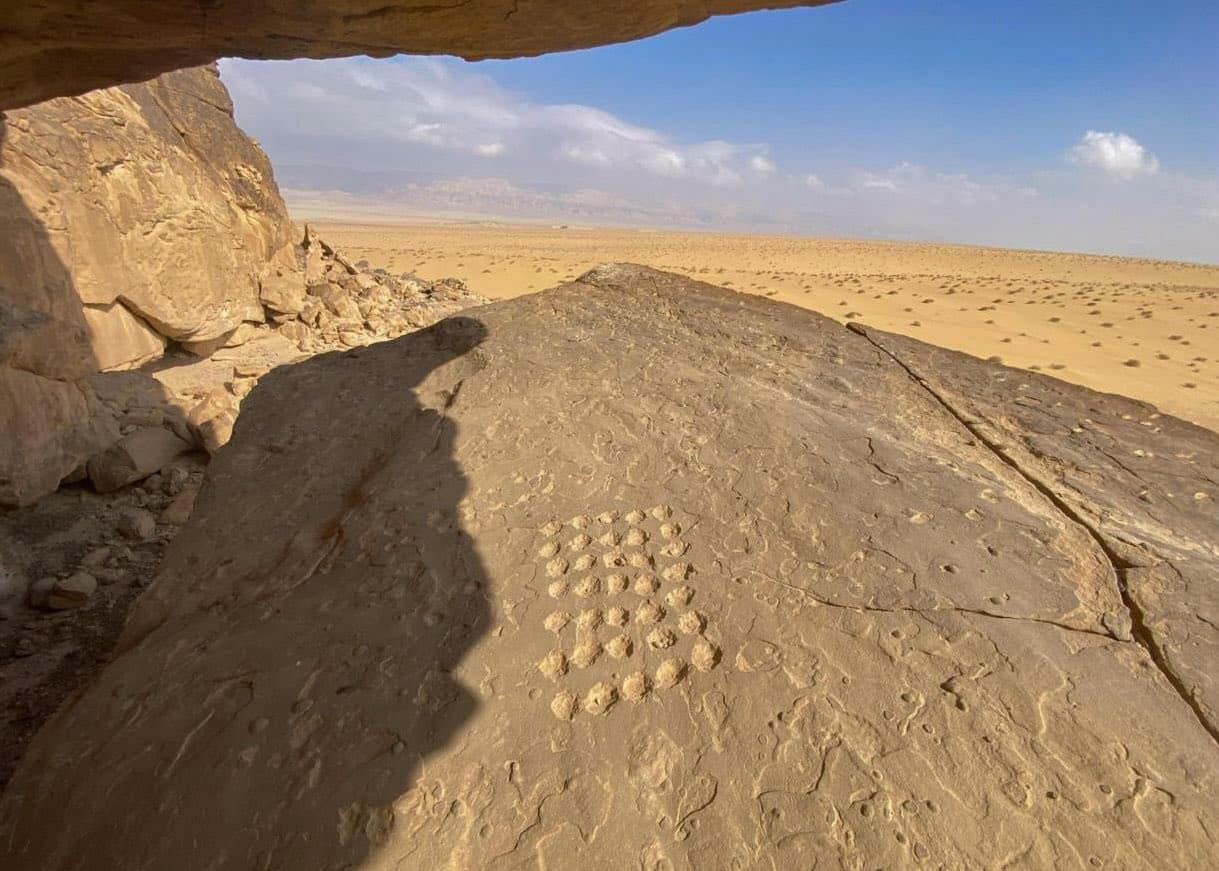 View from inside a natural rock shelter at the Um ‘Irak Plateau