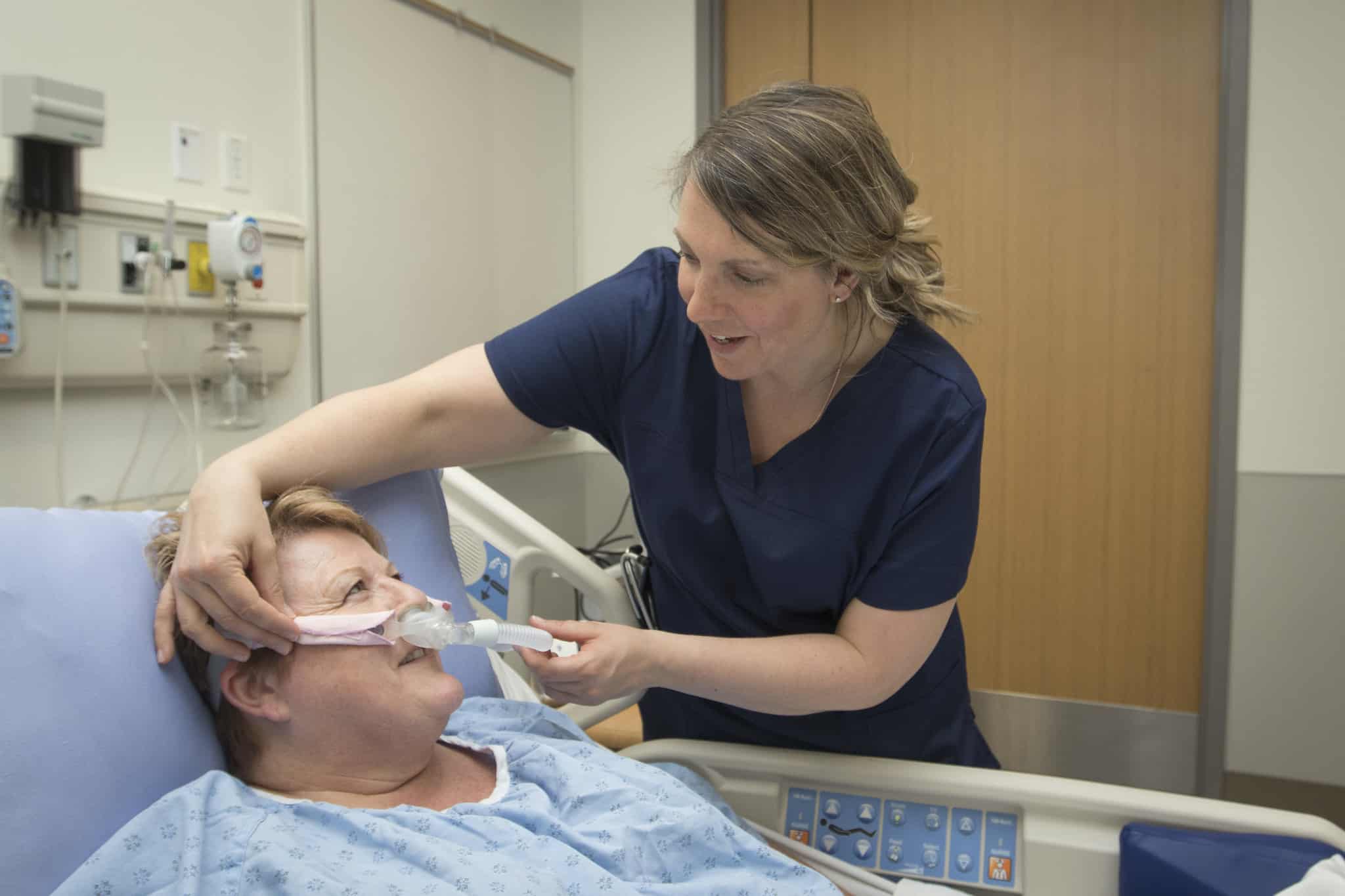 Patient with CPAP machine (Continuous positive airway pressure therapy)